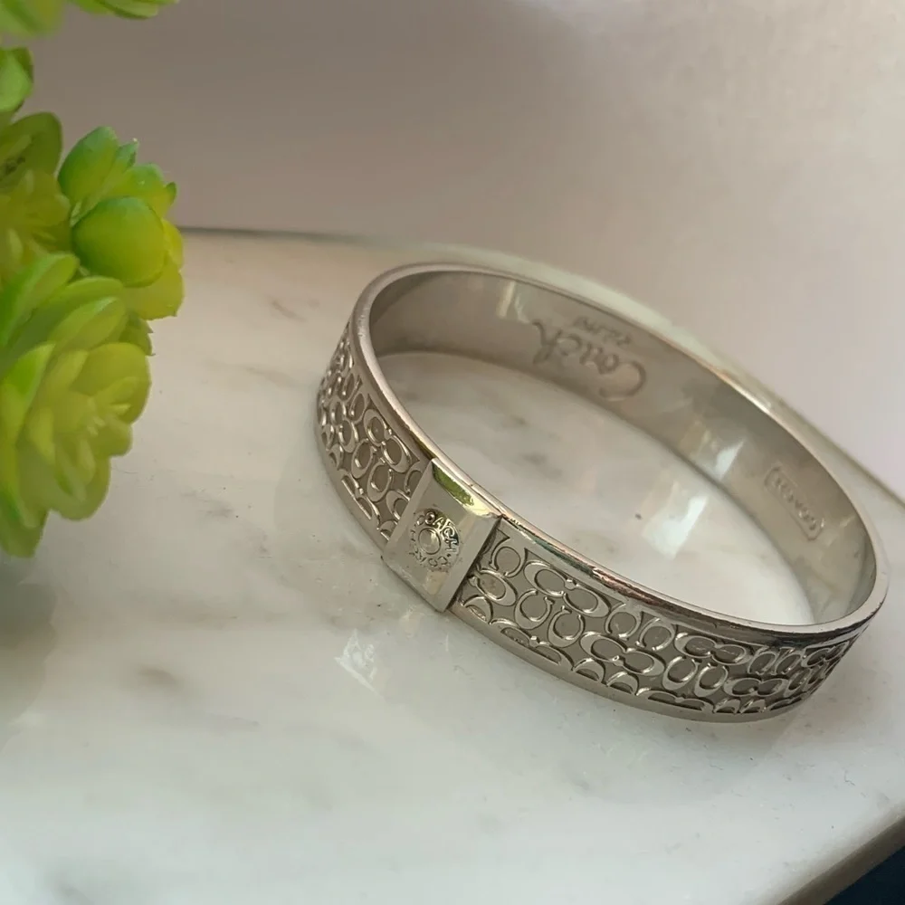 Coach Signature silver bracelet for women. Authentic